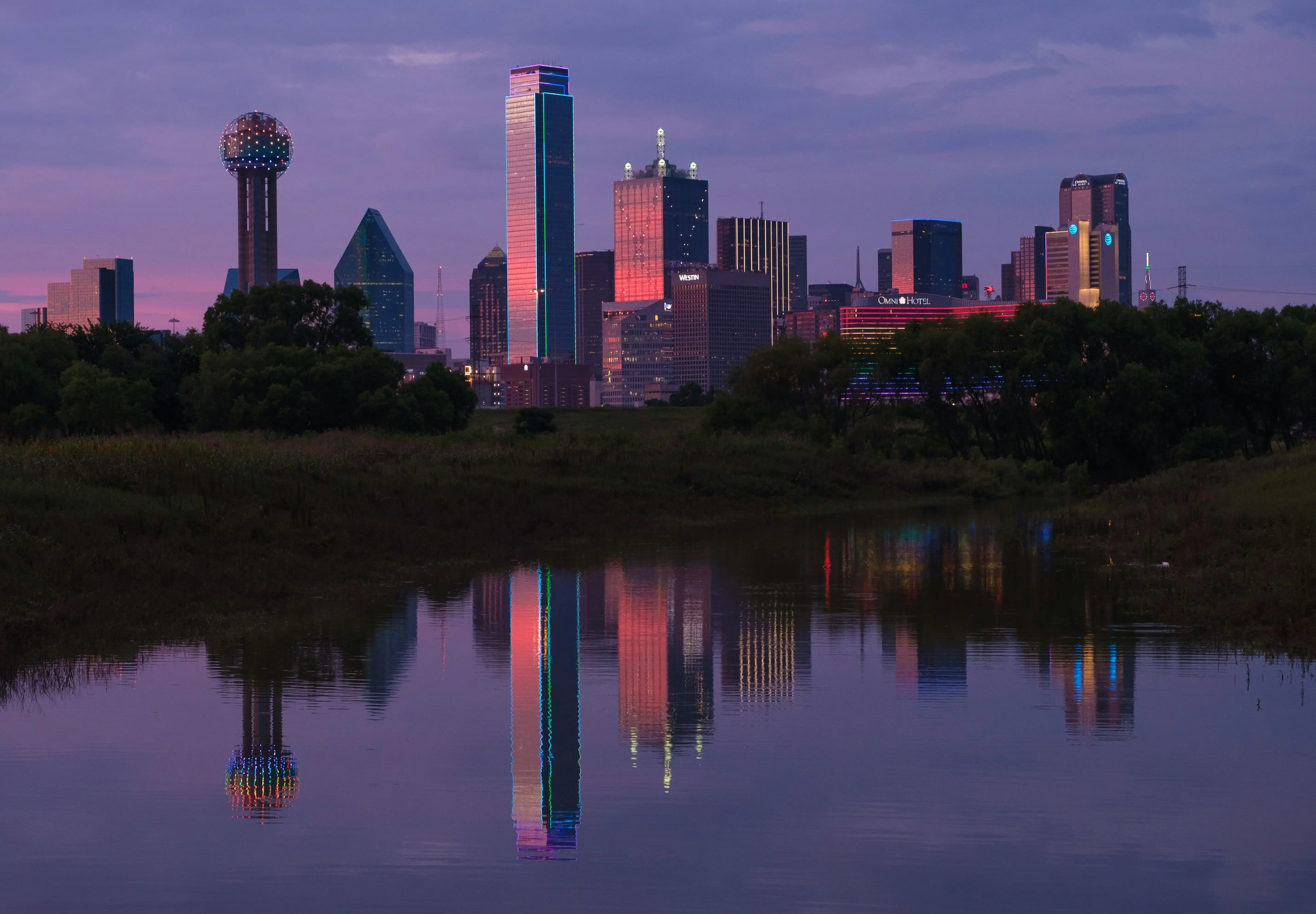Dallas cityscape and its lake reflection in the evening